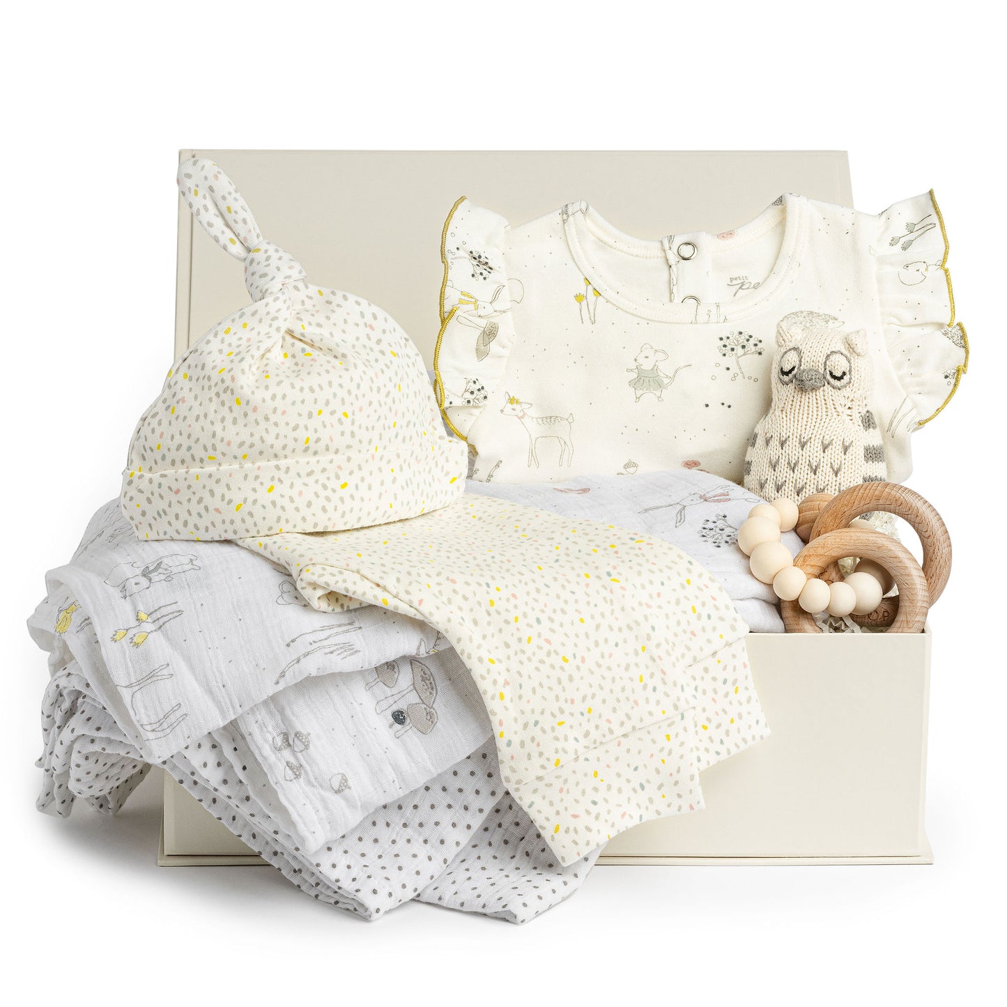 Anna & Amy baby girl gift box with three piece outfit in a magical forest print, bubble teether, knit owl rattle and matching swaddles.